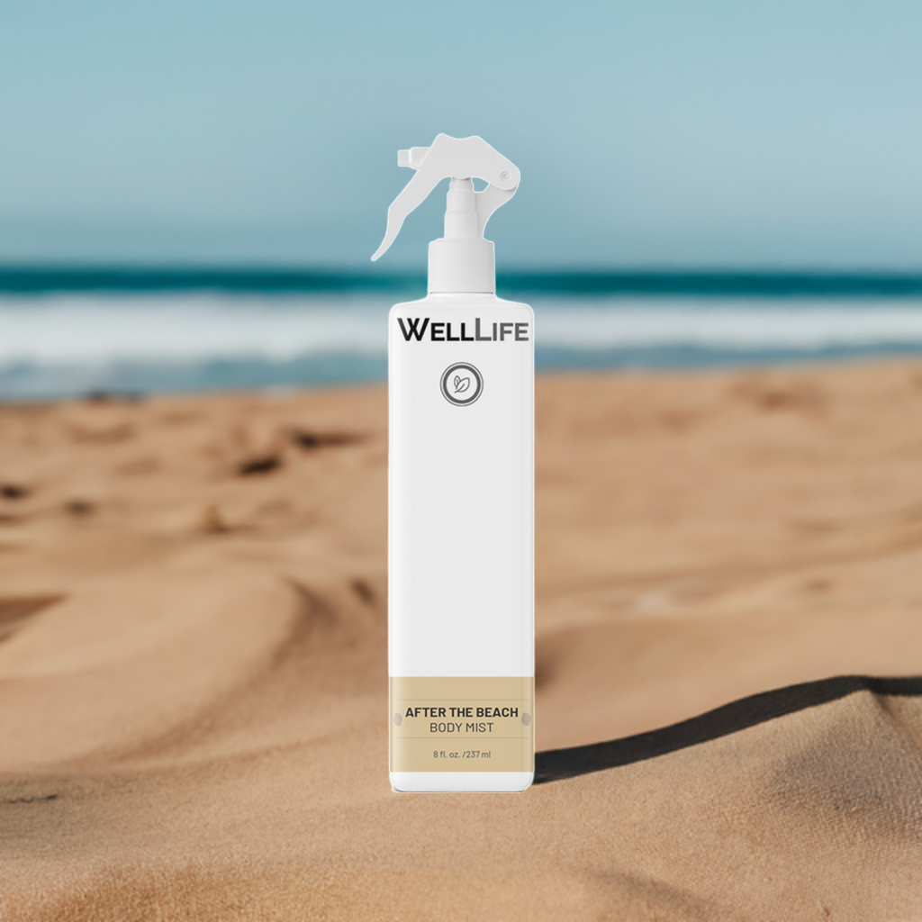 Bottle of Well Life After The Beach Body Mist on an ocean beach. Revitalize your skin after a day in the sun with our After the Beach Cooling and Hydrating Body Mist. Made with all natural, plant-based ingredients, this mist not only provides sunburn relief but also deeply hydrates your skin. Keep your skin feeling and looking its best with our after sun care solution.